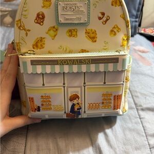 Loungefly Fantastic Beasts Kowalski Bakery Kids Backpack - White and Yellow